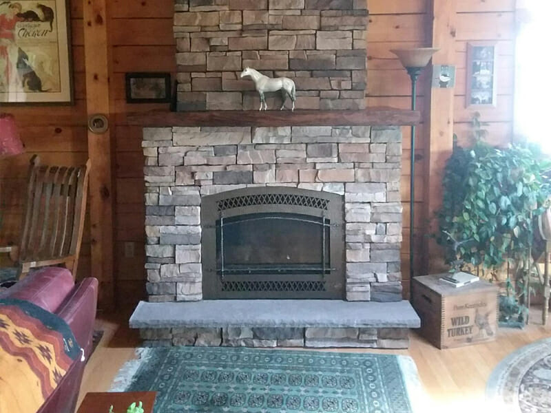 Fireplace in rustic New Jersey home