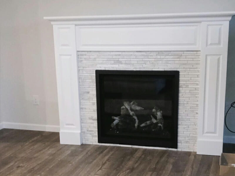 Fireplace in beautiful white room