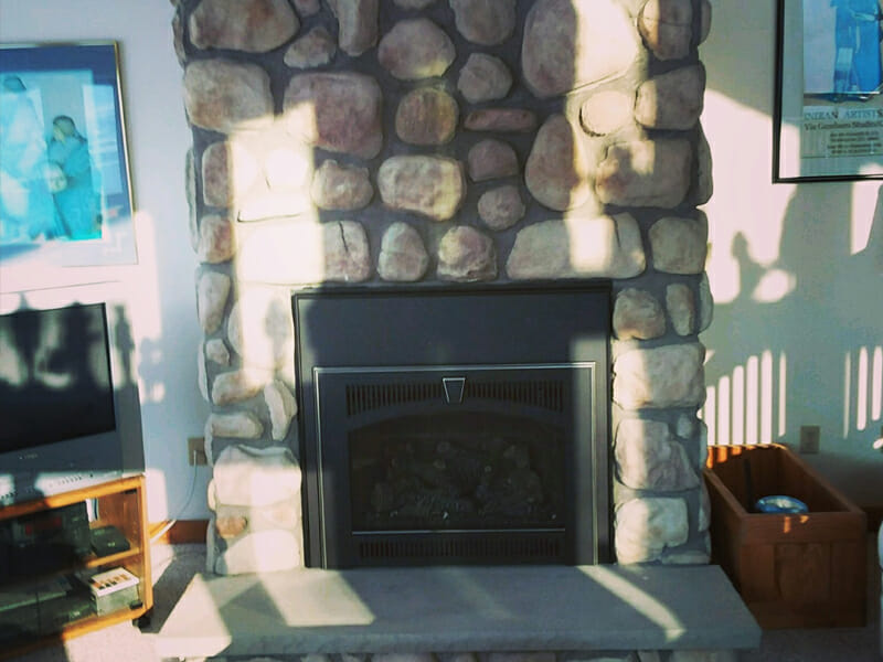 Sunny living room with chimney