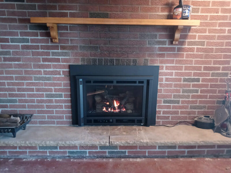 Brick wall in home with chimney built into it